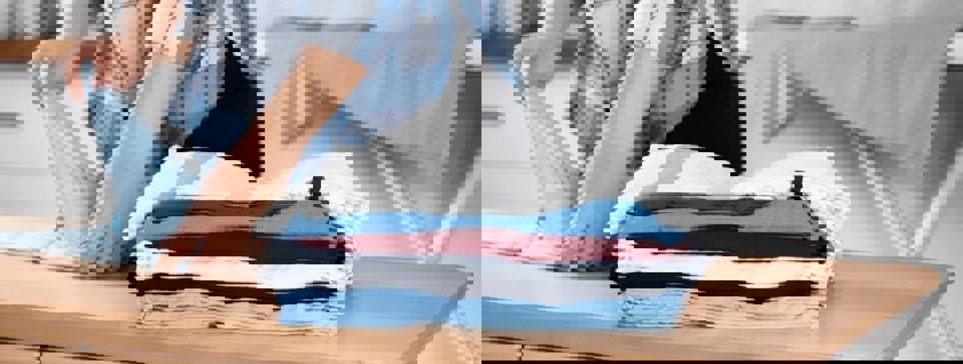 Wash And Fold Stack Of Laundry Min